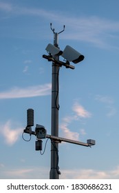 Modern Weather Station, Weather Vane With White Clouds And Blue Sky