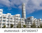 Modern White Apartments in Front of Turning Torso in Malmo; Sweden; Europe