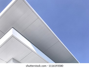 Modern white building against a blue sky