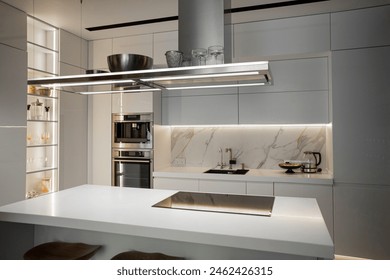 Modern white kitchen with built-in appliances - Powered by Shutterstock