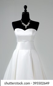 Modern white wedding dress isolated on Grey background