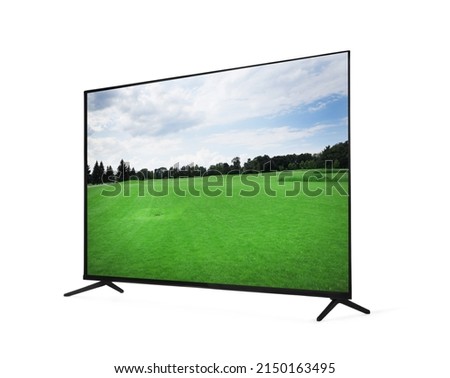 Modern wide screen TV monitor showing beautiful golf course with green grass isolated on white