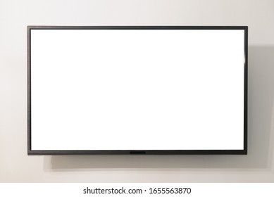 Modern Widescreen TV Set With Blank Screen Hanging On The Wall.