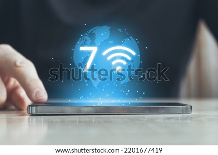 Modern Wi-Fi technology version 7. High-speed wireless Internet. Person clicks on smartphone.