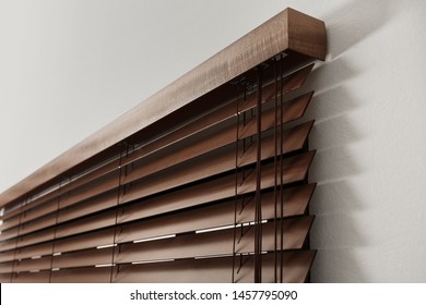 Modern Window With Closed Stylish Wooden Blinds Indoors, Closeup View