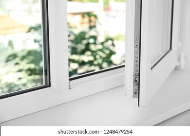 Modern window indoors, closeup view. Home interior