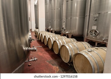 Modern winery making wine in oak barrels and aluminium tanks