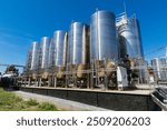 Modern winery production line. Large tanks for fermentation.