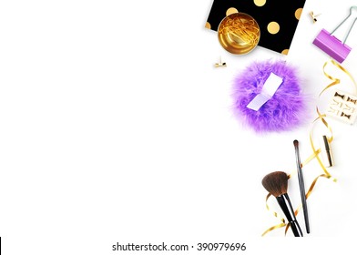 Modern Woman Desk. Make Up Cosmetics, Brushes And Lipstick On White Background Top View. Gold Handbag And Stationery. Mock-up. Feminine Scene. Header Site Or Hero Site. 
Flat Lay Image.