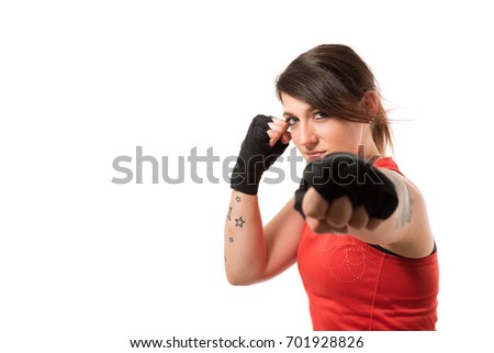 Modern Woman doing martial arts sports - isolated