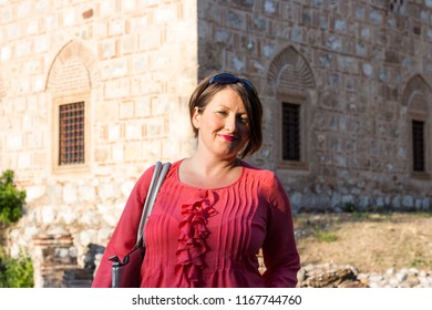 Modern Woman in Pink Blouse Posing in Front of the Mosque - Shutterstock ID 1167744760