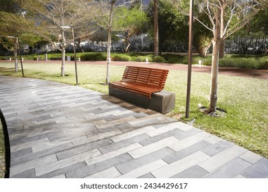 Modern wooden bench at Shaheed Park Kuwait