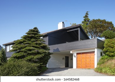 Modern Wooden House With Garage In Norway, Summer Day