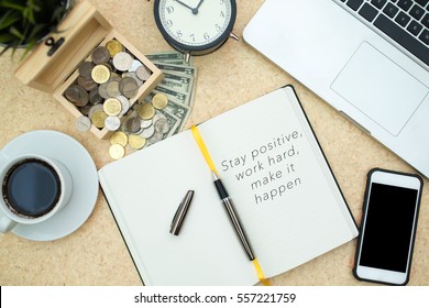 Modern Wooden Office Desk Table With Laptop,smartphone, Box Of Coins, Paper Money, Table Clock And Cup Of Coffee. Writing 