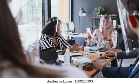 Modern Workplace After COVID-19. Young Happy Beautiful Female Boss Leading Diverse Business People Team Office Meeting.