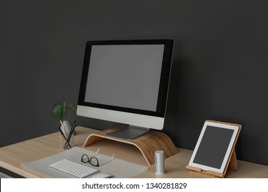 Modern workplace interior with computer on table. Space for text