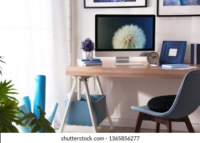 Modern workplace interior with computer on table