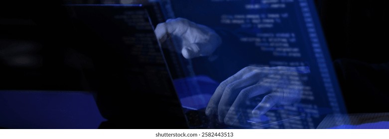 Modern workspace with blue virtual interface displaying fictional programming text. Hands typing on laptop, illustrating cybersecurity, data processing, and futuristic digital concepts. - Powered by Shutterstock - Get 15% off with code: PIKWIZARD15