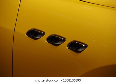 Modern yellow car detail chrome side wing air flow marker fender intake vent cover trim outlet grid