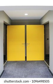 Modern yellow room door isolated on white background