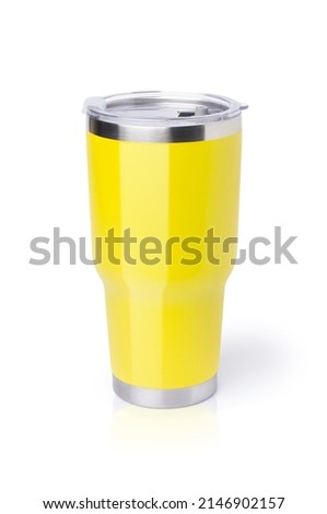 Modern yellow stainless steel drinking glass (thermos tumbler mug) isolated on white background. Clipping path.