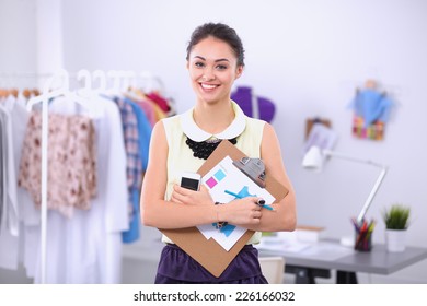 Modern Young Fashion Designer Working At Studio.isolated