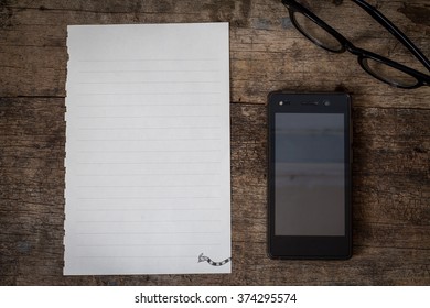 modern young person. Different objects on wooden background.