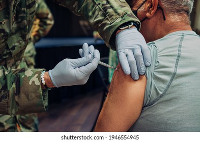 Moderna Vaccine Injection For COVID19 By Air Force Soldier.