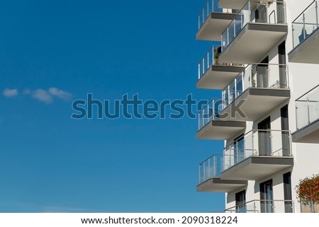 Modernt apartment buidling with balconies on a sunny day