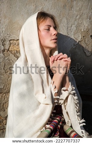 Similar – Image, Stock Photo Lonely veiled  girl in the barren Arabian desert at Sunset