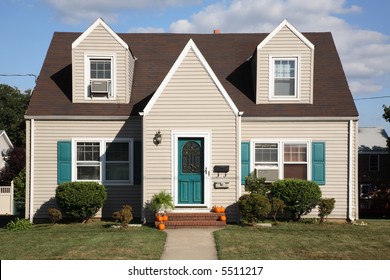 A Modest, Two-level House In A Small Town.