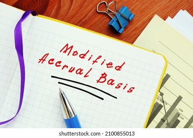  Modified Accrual Basis phrase on the piece of paper.