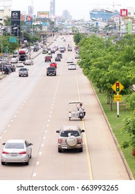 Modified Moped With Sidecar Driving In Fast Lane On Almost Empty Street Near  The 