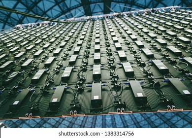 Modular LED display for a display screen wall to project video walls on the mounted led modular panel system. grid video rgb diode light mesh equipment for video grip billboard digital screen panel