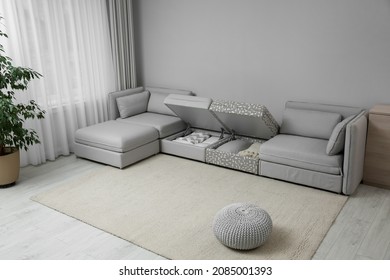 Modular Sofa With Storage Near Wall In Living Room. Interior Design