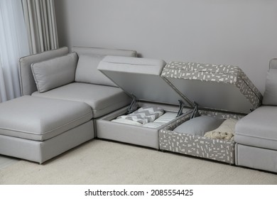 Modular Sofa With Storage Near Wall In Living Room. Interior Design