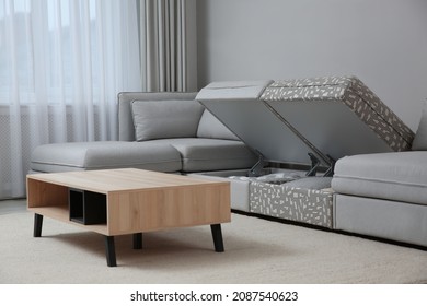 Modular Sofa With Storage Near Wall In Living Room. Interior Design