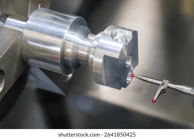 The modular touch probe checking the aluminum shaft parts on CNC lathe machine. The quality control of turning parts with CMM probe.