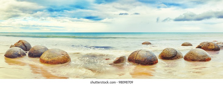 Moeraki Boulders panorama. New Zealand - Powered by Shutterstock