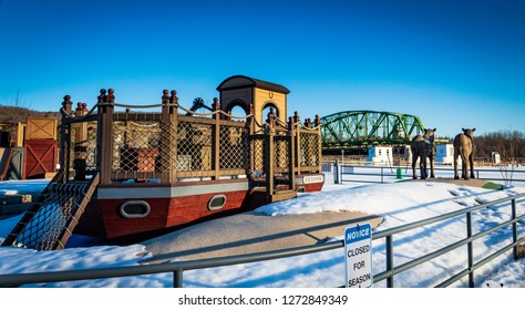 Mohawk, NY/USA-March 24, 2018:
Recreational Park At Mohawk Valley Welcome Center Featuring Canal Boat Children Playground And Horse Statues. Located On Westbound Of I-90.