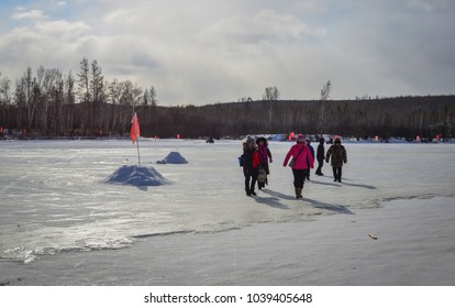 Mohe, China - Feb 19, 2017. People Walking At A Winter Park In Mohe County, Heilongjiang Province, China.