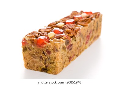 Moist, Delicious Christmas Fruitcake Isolated On White Background.