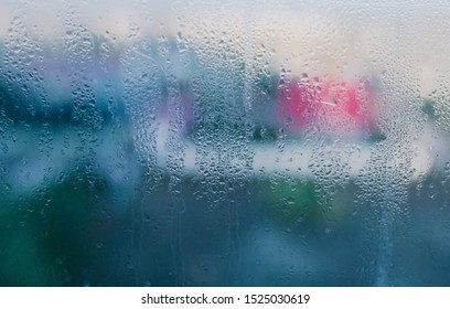 Moist On Wet Window. Window Glass With High Air Humidity. Background Of Natural Water Condensation. High Level Of Dampness In Apartment