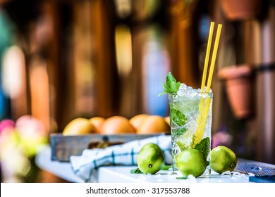 Mojito Cocktail Glass On The Bar In Pub Or Restaurant.