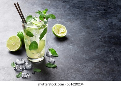 Mojito cocktail on dark stone table. With space for your text  - Powered by Shutterstock