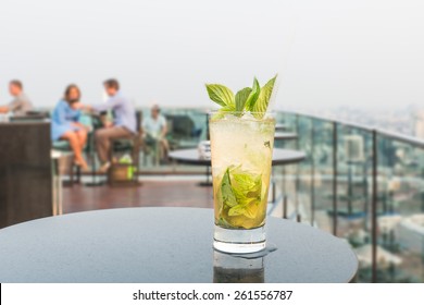 Mojito Cocktail On Table In Rooftop Bar