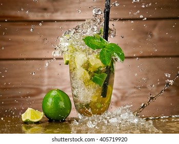 Mojito Cocktail On Wooden Background Splash