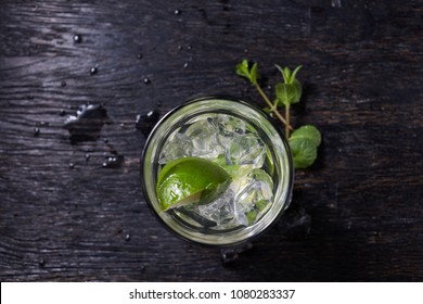 Mojito Cocktail From Top, Vodka Or Soda Drink With Lime Mint Isolated On Black Wooden Background