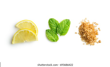 Mojito ingredients. Lemon, mint and cane sugar isolated on white background. Sweet sugar, mint leaves and lemon.