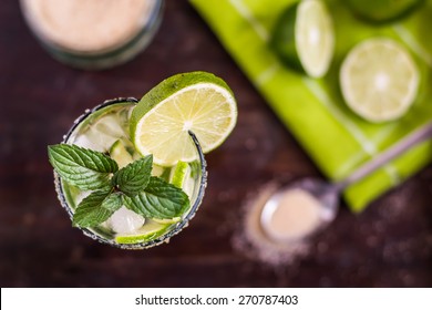 Mojito Lime Alcoholic Drink Cocktail On Wooden Table Overhead